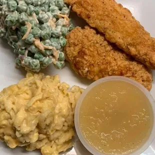 Chicken strips (adult meal program) (pictured with mac &amp; cheese, pea salad, applesauce)