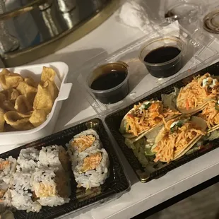 Sushi Dinner (Spicy Crab Roll, Sushi Taco spicy crab, Crab Meat with soy and eel sauce )