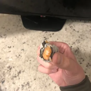 a person holding a donut