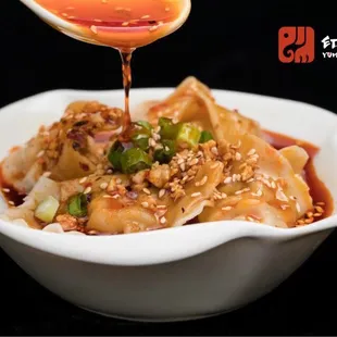 Wonton w/ spicy peanut sauce