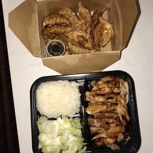 a meal in a takeout box