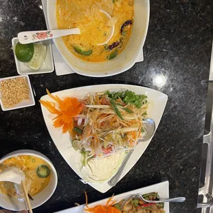 a variety of dishes of food