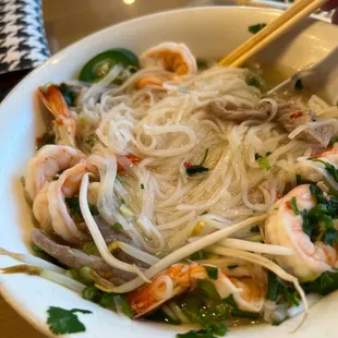 Seafood pho o asked to add brisket to it. I had already eaten half during this picture. I HAD to leave them a review