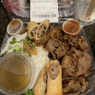 B03 Rice vermicelli with egg rolls and grilled pork