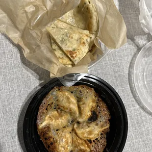 Pork dumplings (pan fried) and green onion pancake