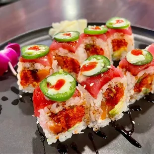 a piece of sushi on a plate
