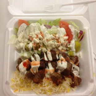 Gyro over rice with salad