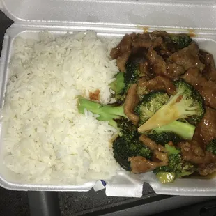a meal in a styrofoam container