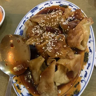 Won ton in hot sesame sauce