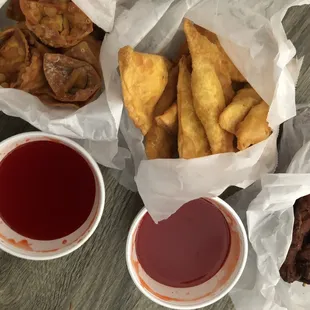 Fried wontons, crab rangoon, chicken on a stick