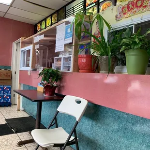 a table and chairs in a restaurant