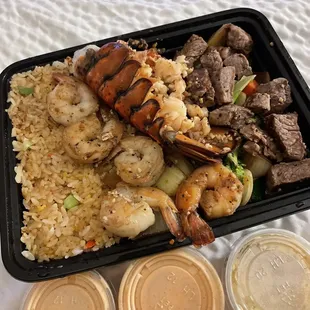 lobster, ny steak and shrimp, yummy sauce and garlic butter