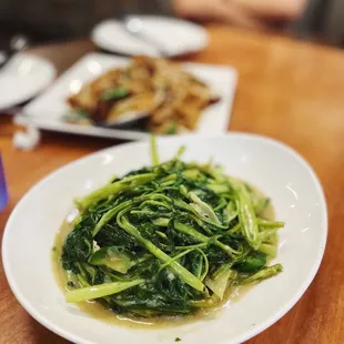 a plate of green vegetables