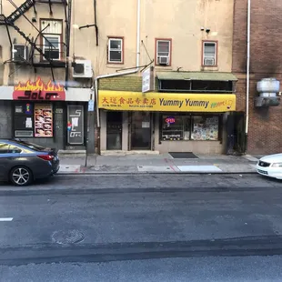 two cars parked on the street
