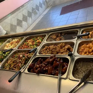 a buffet with many different types of food