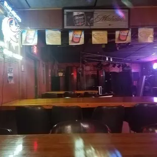 a wooden table and chairs