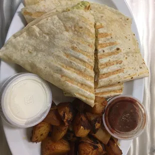 Breakfast quesadilla- seasoned potatoes. So good!