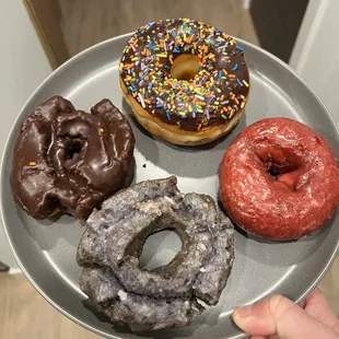 Chocolate sprinkle, chocolate old fashioned, blueberry old fashioned, and red velvet.