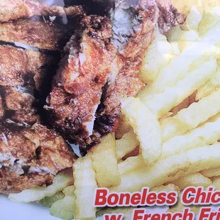 a plate of chicken and french fries
