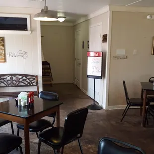 Front of house by door. Bathrooms and I think gaming back there.