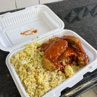 3 wings with mambo sauce and fried rice