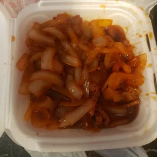 a take out container of food