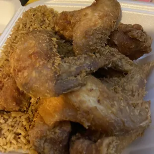 chicken and rice in a styrofoam container