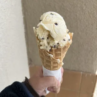 Chocolate chip cookie dough on waffle cone