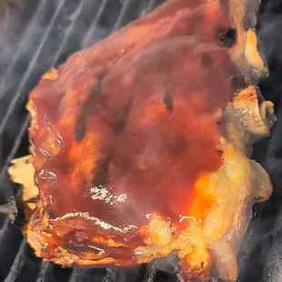a piece of meat on a grill