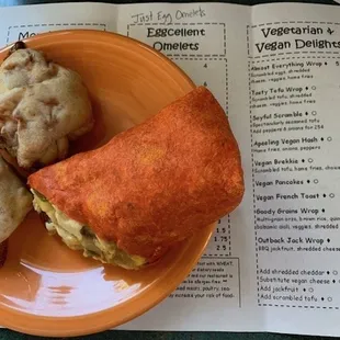 2 vegan pepperoni rolls and half a toful scramble wrap with vegan menu.