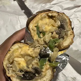 Half Size Chicken cheese steak w/added peppers onions mushrooms extra cheese.