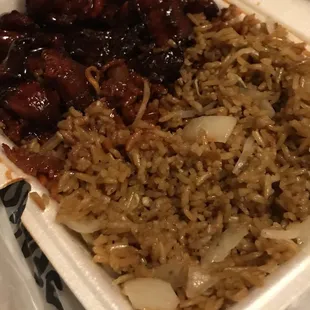a container of rice and meat