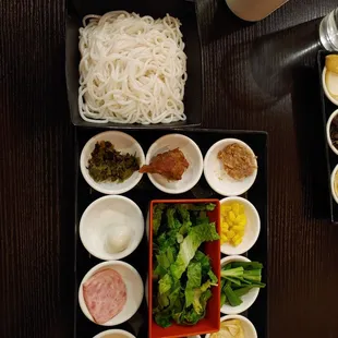 Rice noodles and sides that go in soup