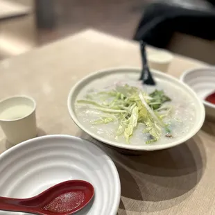 Jook with silky pork and a 1,000 year egg.