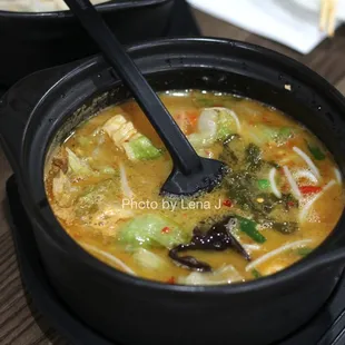 Rice Noodle in Picked Pepper Soup 过桥金汤米线 ($12.99)