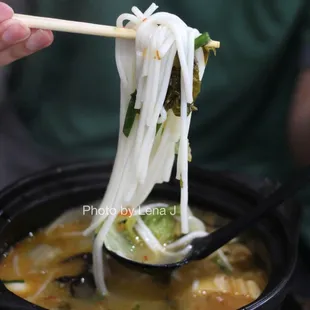 Rice Noodle in Picked Pepper Soup 过桥金汤米线 ($12.99)