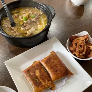 Rice Noodle in Green &amp; Red Chili Soup, with fat beef; Chive Pockets and added pork intestines.