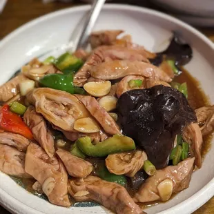 a bowl of chicken and vegetables
