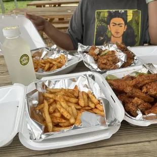 Got the lemonade, fries and all three types of wings. The spicy one were the best (and not very spicy at all... just flavorful).