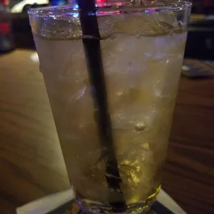 a drink in a tall glass