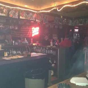 a bar with a neon sign