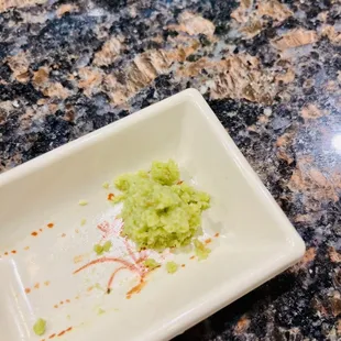 The sushi and sashimi usually come with standard wasabi. For me, I asked for the "fresh wasabi" that contains better texture and taste.