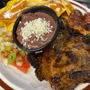 Carne asada con tajadas