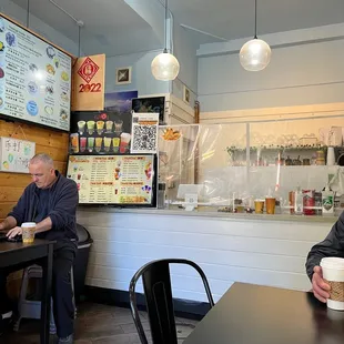 two men sitting at a table