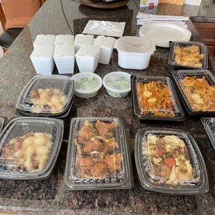 a variety of food in plastic containers