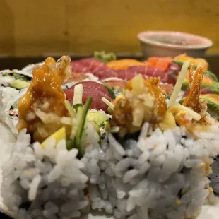 a plate of sushi and rice