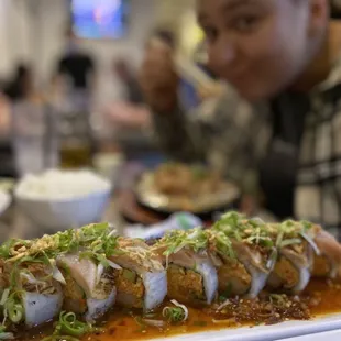 a sushi roll on a plate