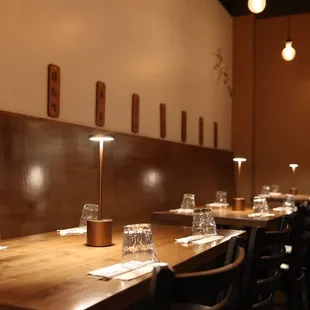 a row of empty tables in a restaurant