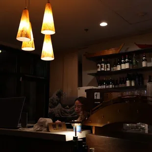 a man sitting at a bar