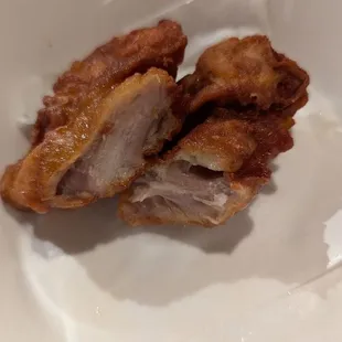 Chicken is cut after fried. Thankfully both halves were united in the bowl